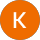 A round orange button with the letter k in it.